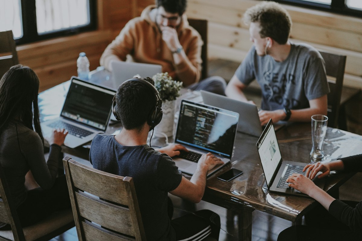 Engineers working through a product together