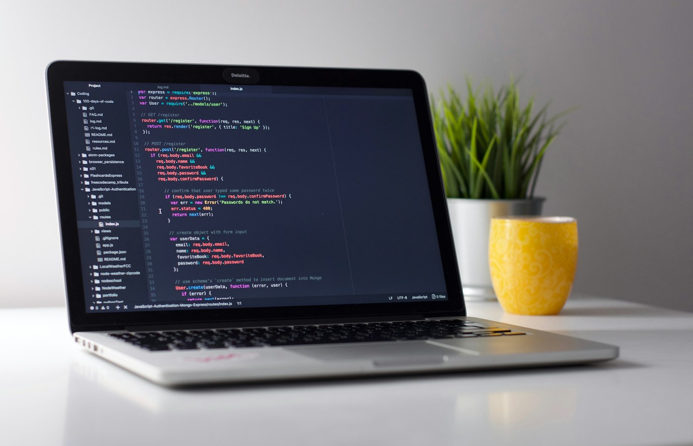 Application code open on a laptop